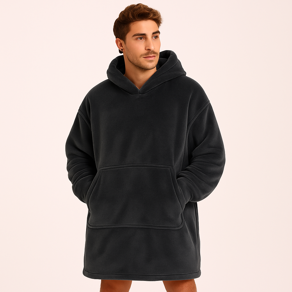 Side profile of dark grey wearable blanket with hood and pocket