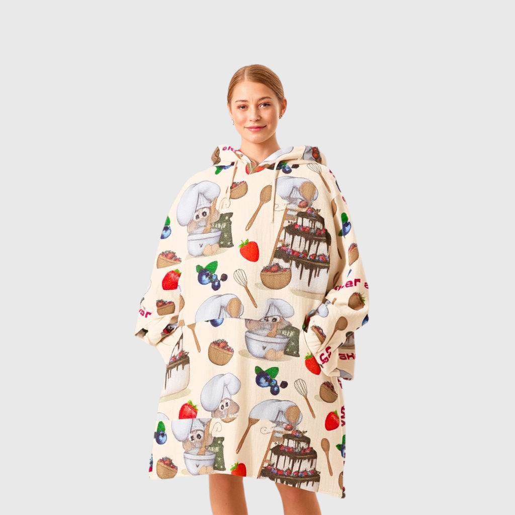 Woman smiling wearing soft fleece Mouse Chef hoodie blanket